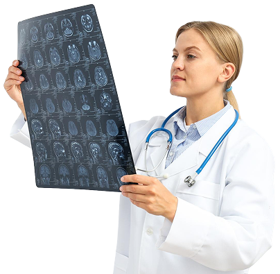 A female doctor holding and analyzing an MRI scan film