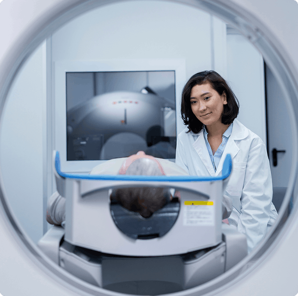Radiologist overseeing patient MRI scan at Harding Radiology Center